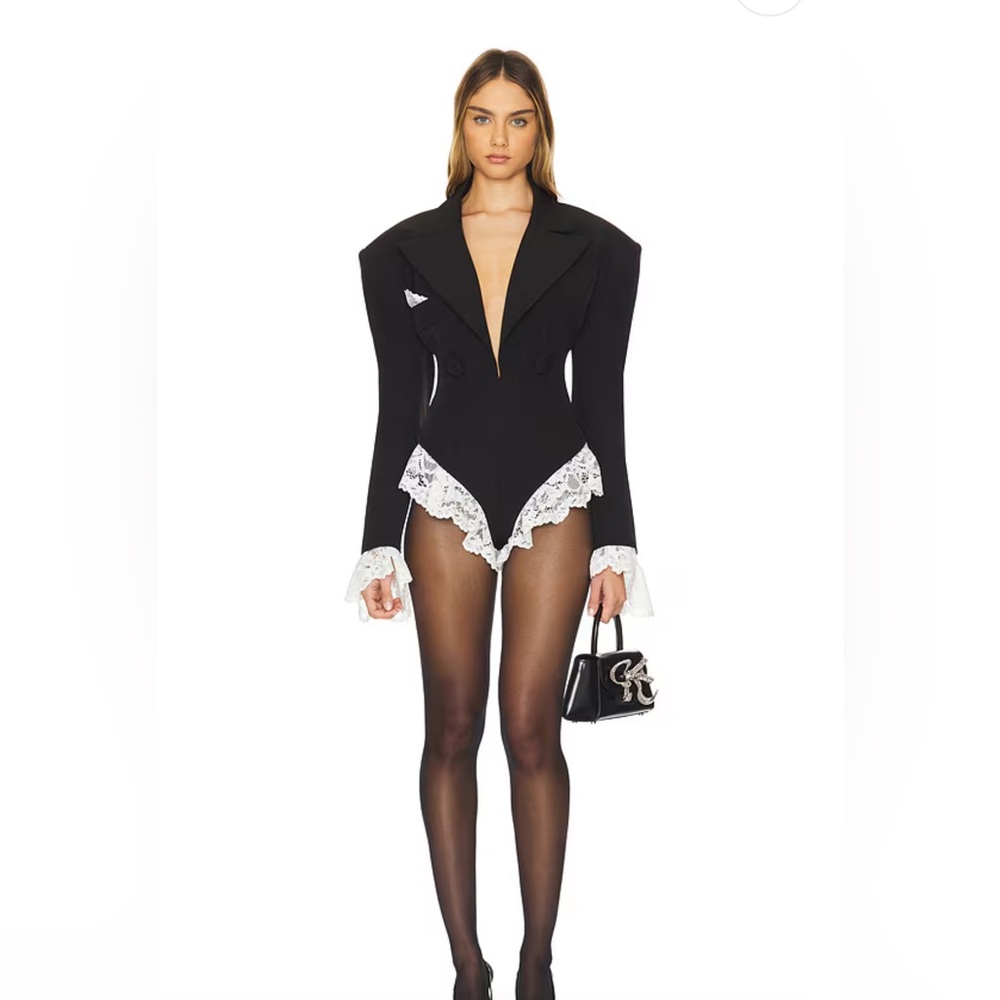 Rika Romper in Black
The Dolls House